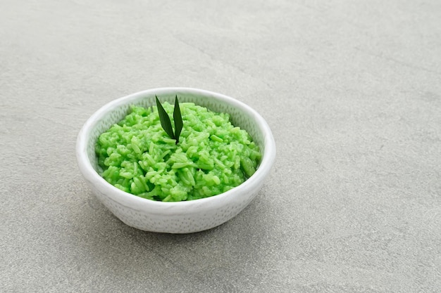 Tape Ketan Pandan is a typical Indonesian food made from fermented sticky rice Served in small bowl