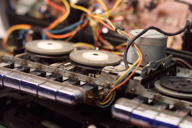 Photo tape pulling mechanism of the cassette deck tape recorder repair