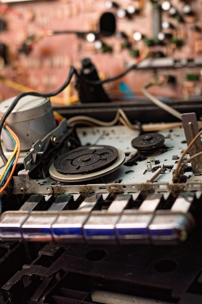 Photo tape pulling mechanism of the cassette deck tape recorder repair