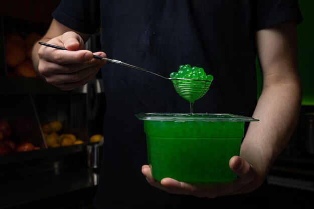 tapioca pearls for bubble tea in a spoon