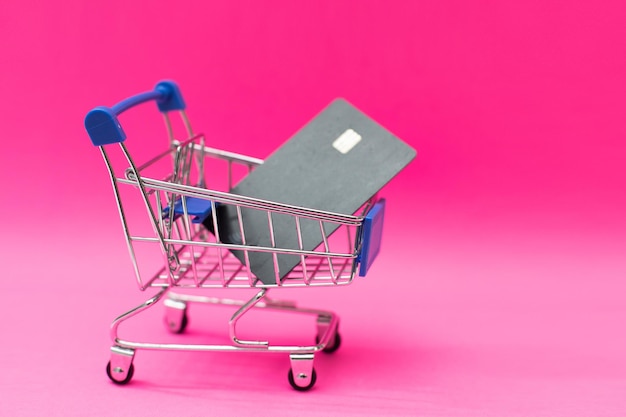 Photo target electronic market. shopping cart and credit cards