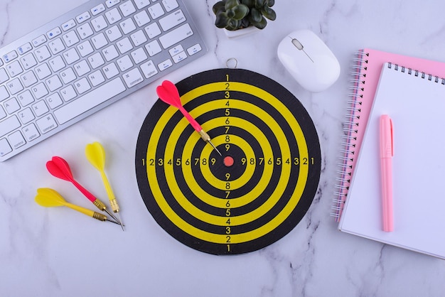 Target and goal concept with darts and arrows