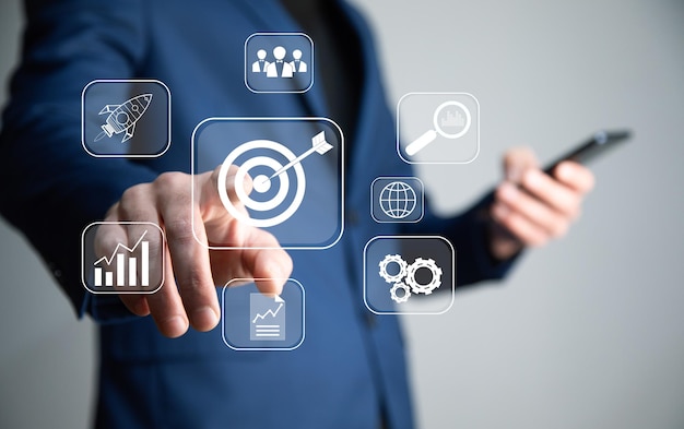 Targeting the business concept target with digital marketing icons on virtual screen internet network connection Business goal