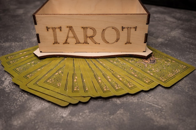 Tarot cards spread on table with crystal ball fortune telling