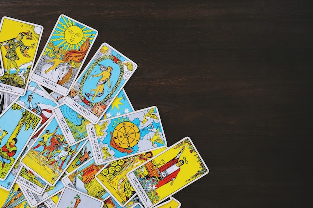 Tarot cards on wooden table