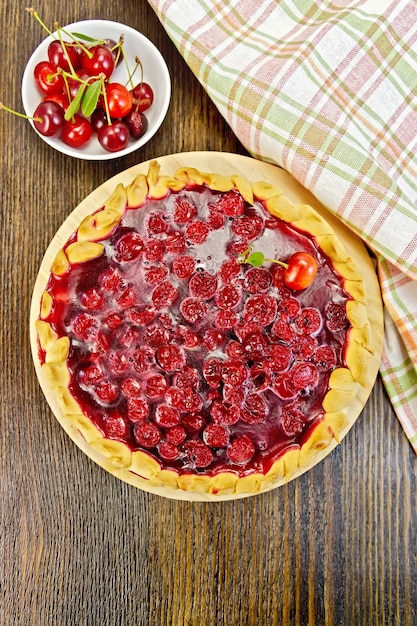 Tart cherry with berries on board top