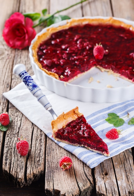 Tart with fresh raspberries in jelly fill