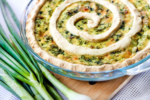 Photo tart with goat cheese and green onions