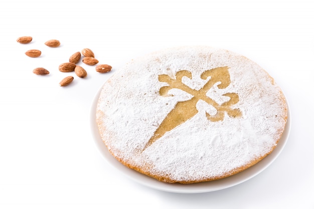 Tarta de Santiago. Traditional almond cake from Santiago in Spain, isolated on white background