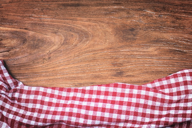 Tartan, wooden background