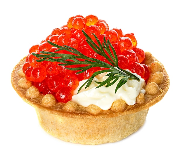 Tartlet with red caviar isolated on white background