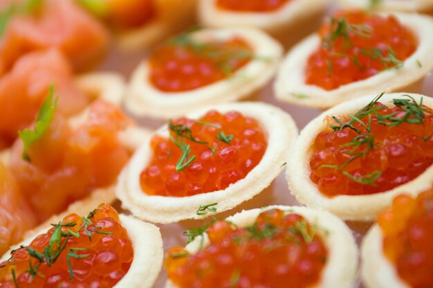 Tartlet with red caviar   . Shallow depth-of-field