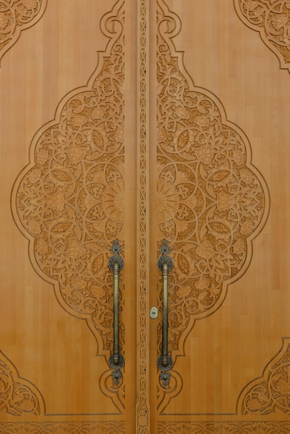 Tashkent Uzbekistan December 2021 Wooden carved beautiful doors in the architecture of the city