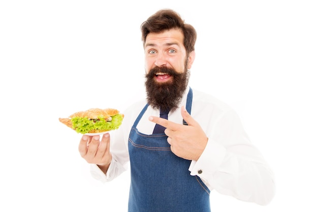 Taste a little Happy cook point finger at small plate Bearded man smile with healthy snack Enjoying snack food Lunch Appetizer Snack bar Restaurant and canteen Snack that gives you pleasure