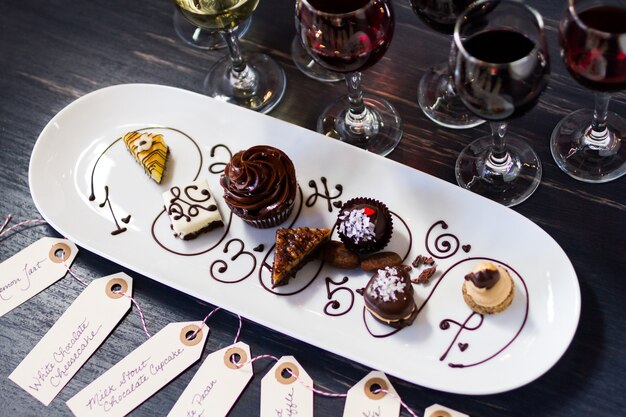 Tasting of wine and pattie chocolate pastries.