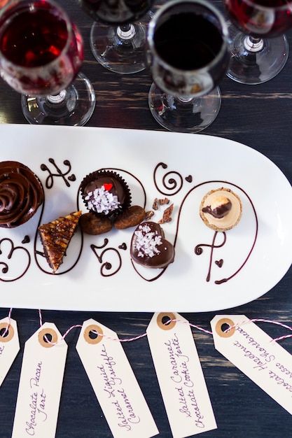 Tasting of wine and pattie chocolate pastries.