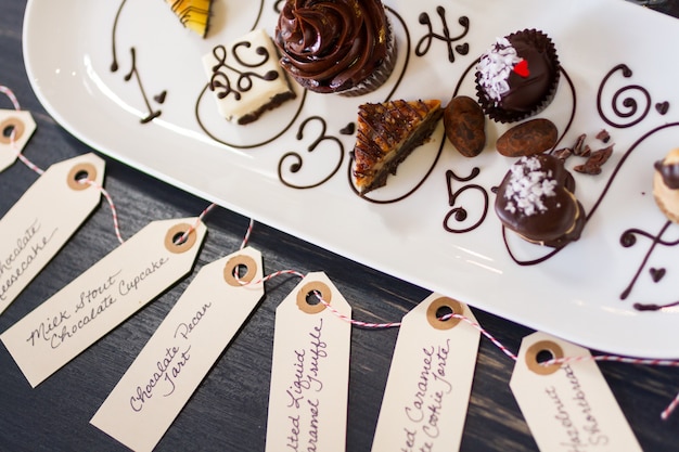 Tasting of wine and pattie chocolate pastries.