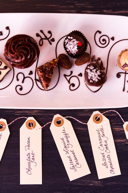 Photo tasting of wine and pattie chocolate pastries.