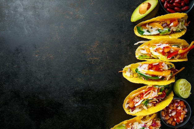 Tasty appetizing tacos with vegetables