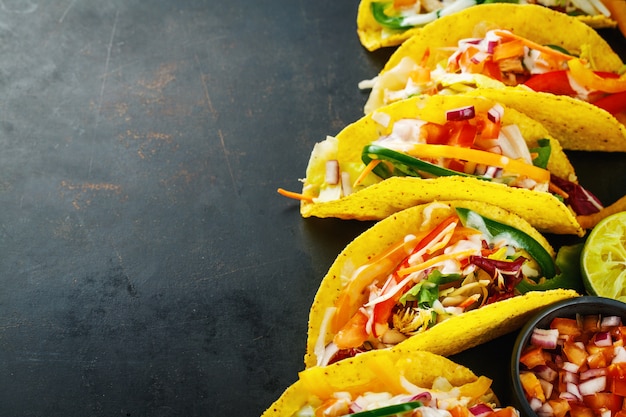 Tasty appetizing tacos with vegetables