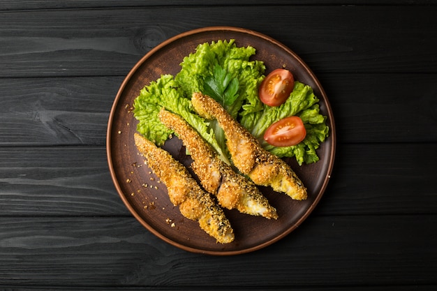 Tasty baked fish on plate