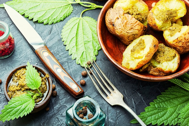 Tasty baked potato with herbs and spices