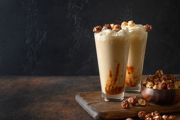 Tasty banana milkshake garnished with caramel