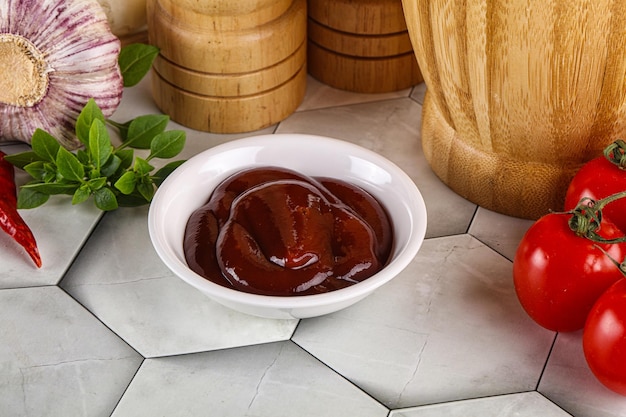 Tasty barbecue sauce in the bowl