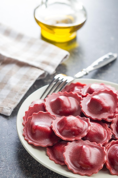 Tasty beetroot ravioli on plate