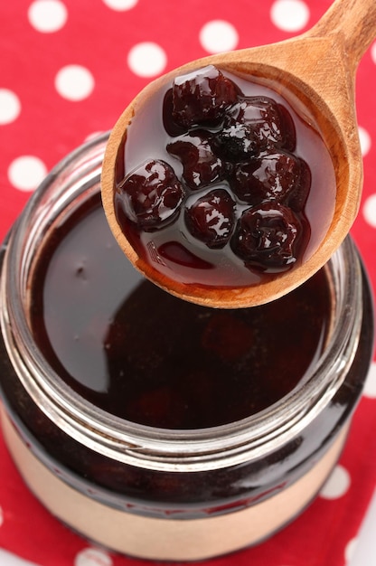 Photo tasty berry jam close up