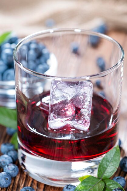 Photo tasty blueberry liqueur