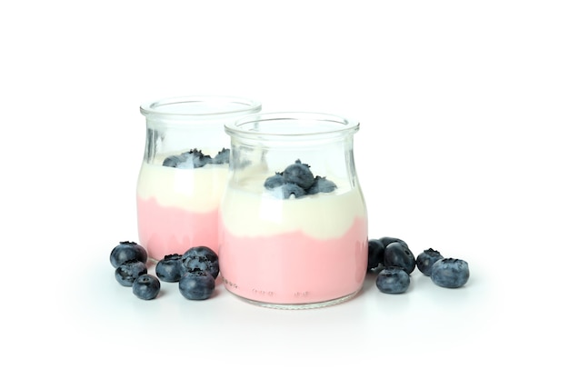 Tasty blueberry yogurt isolated on white background