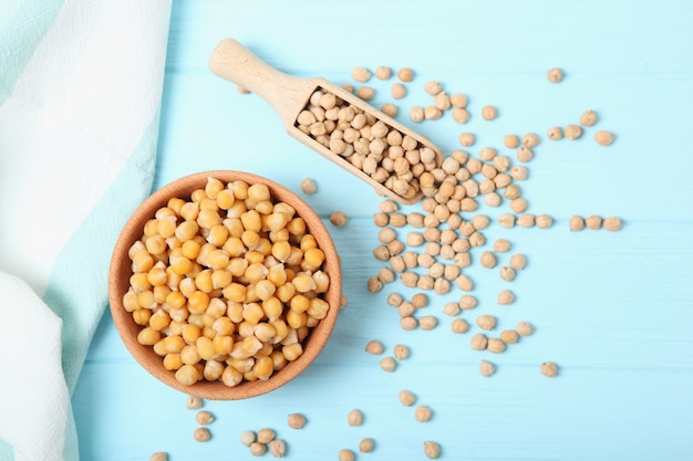 Tasty boiled chickpeas on the table closeup