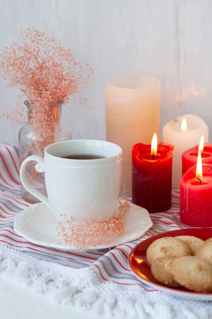 tasty break. cup of tea with a plate of cookies.