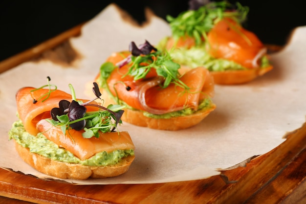 Tasty bruschetta with salmon