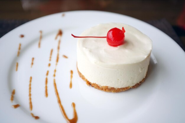 Tasty cake on plate in cafe