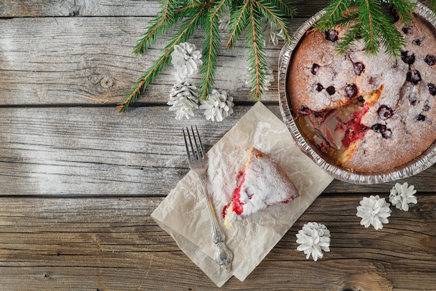 Tasty cake with berries on table close-up