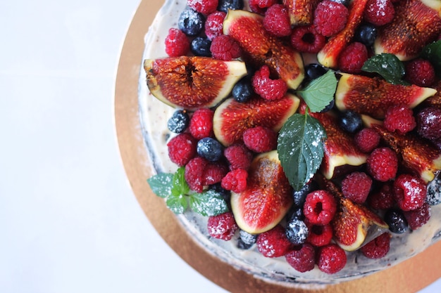 tasty cake with strawberry and figs fruit
