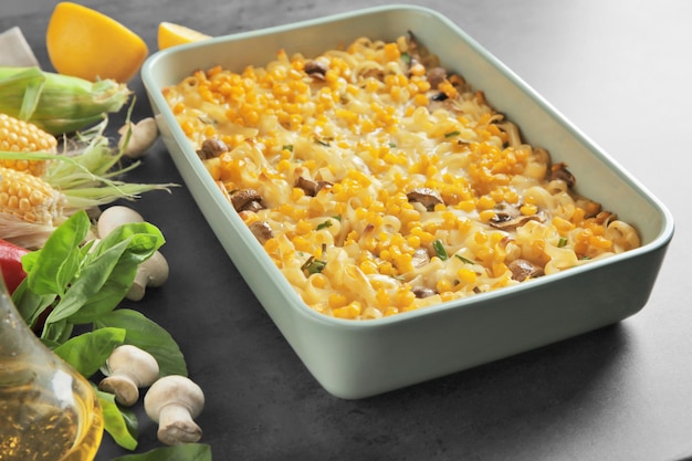 Tasty casserole with corn in baking dish