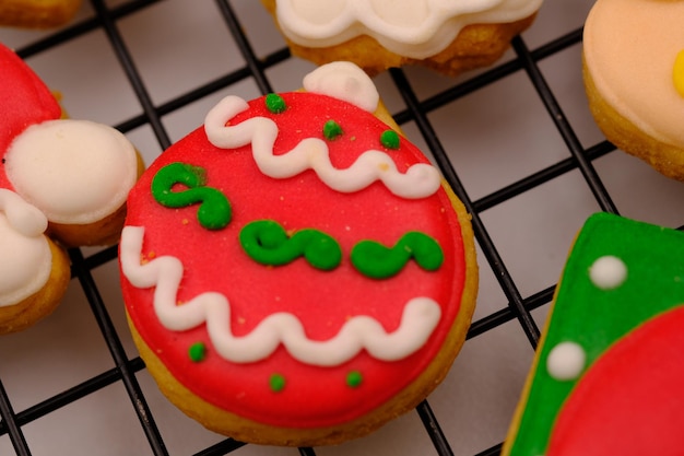 tasty Christmas cookies on a cooling rack. delicious colorful Christmas cookies. x-mas cookies.