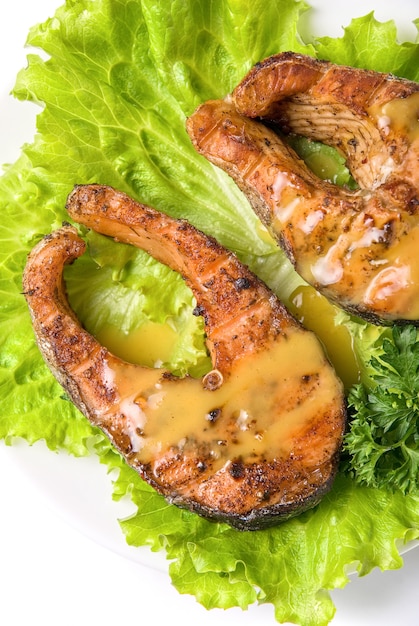 Tasty chum salmon fish dish isolated on a white background