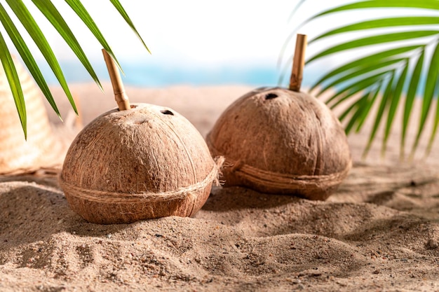 Tasty coconut milk in shell on an resort island