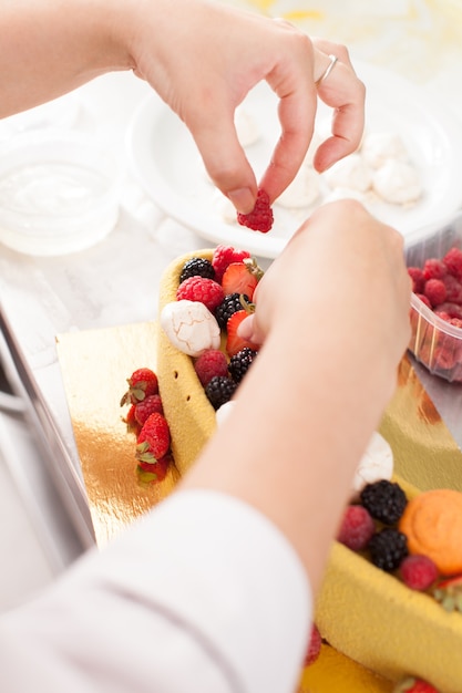 Tasty colorful cake with fresh summer berries