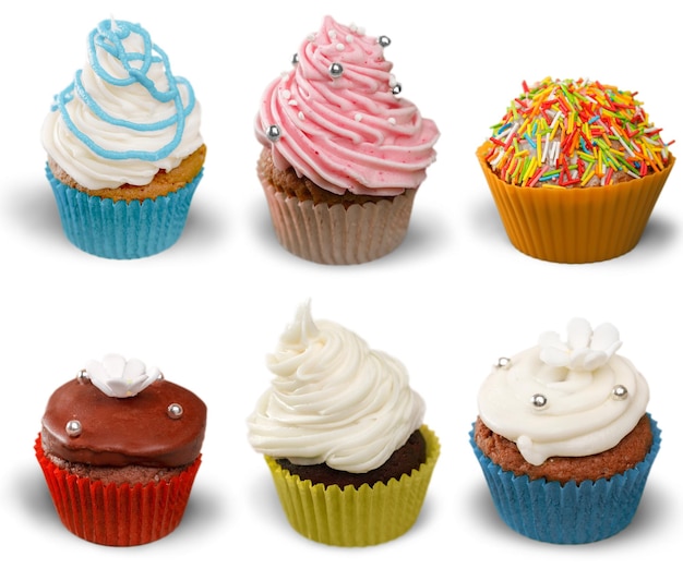 Tasty Colorful cupcakes on background