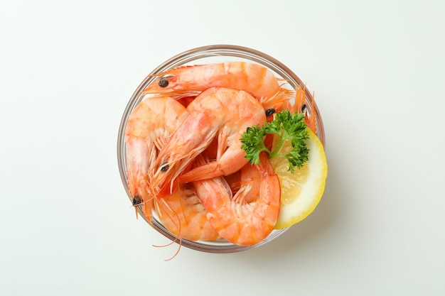 Tasty cooked shrimps in bowl on white background