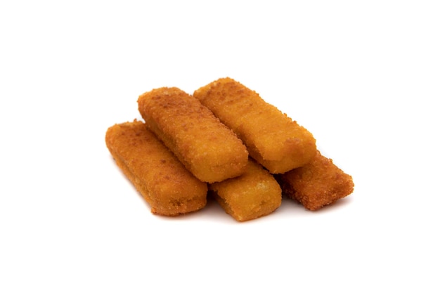 Tasty crispy fried fish sticks (fish fingers) on white background. Fast food concept.