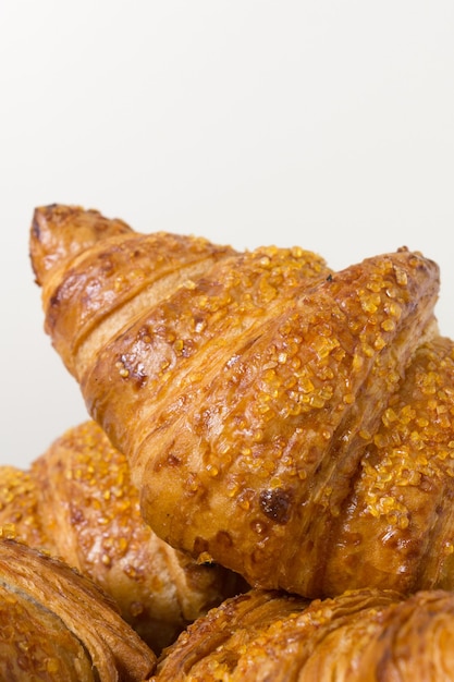 Tasty croissants on white background French food Close up