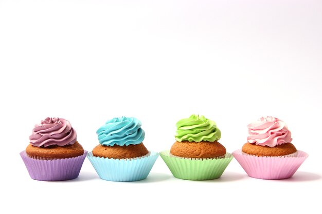 tasty cupcakes on a white background closeup