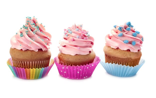 Tasty cupcakes on white background