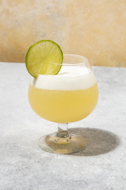 Tasty daiquiri cocktail with lime slice